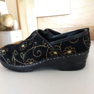 Dansko vegan black with yellow clogs